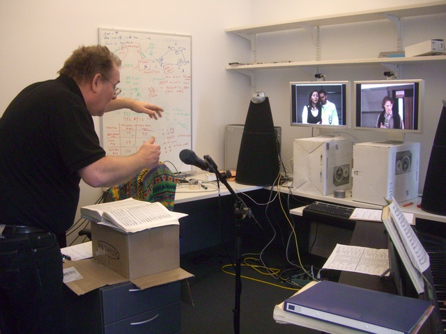 Niels Muus conducting remote singers
